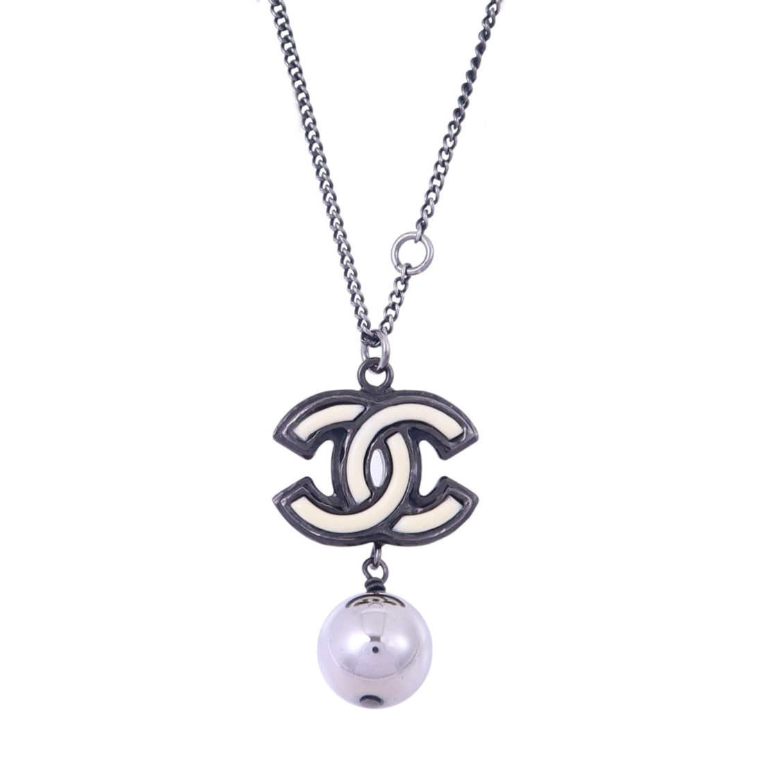 CHANEL B13 B CC Pendant Necklace in Black White Silver Tone PVC: CHANEL B13 B CC Pendant Necklace in Black White Silver Tone PVC This CHANEL CC necklace features a striking design with black and white PVC elements set in metal. Crafted in France, this women's neckl