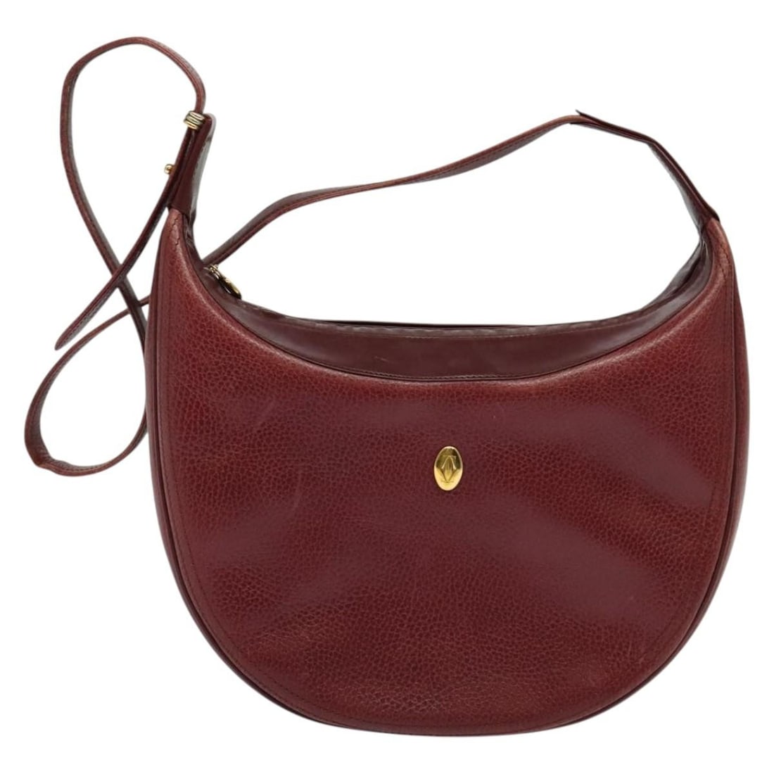 Burgundy Leather Must de Cartier Shoulder Bag for Women: Burgundy Leather Must de Cartier Shoulder Bag for Women This Must de Cartier Shoulder Bag is crafted from burgundy leather and designed for women. Made in Italy, it features a classic silhouette with