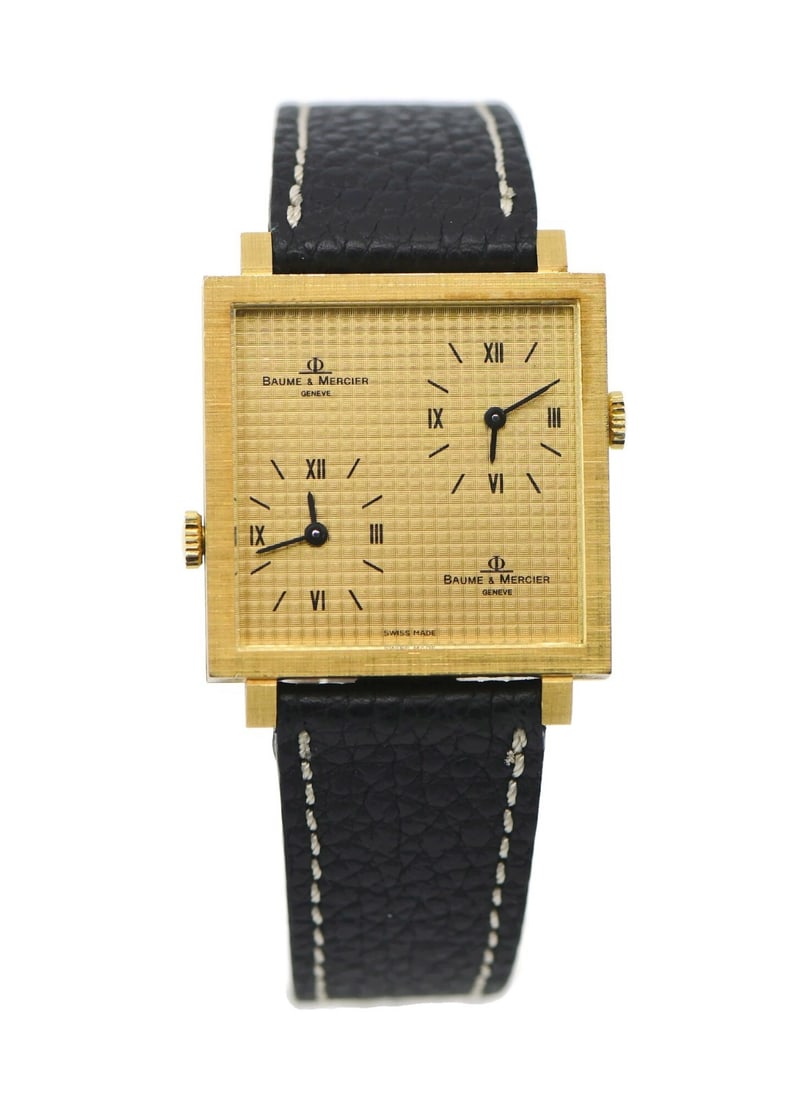 Baume & Mercier Dual Time 18K Gold Watch Ref 32001 Authentic Boxed: Baume & Mercier Dual Time 18K Gold Watch Ref 32001 Authentic Boxed This exquisite Baume & Mercier Dual Time watch showcases a sophisticated design crafted in 18K yellow gold. The timepiece features a