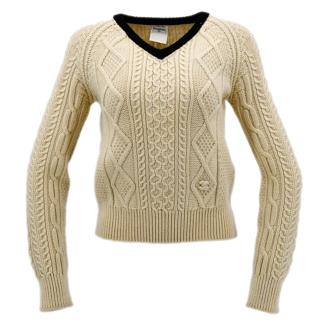 Chanel Vintage Ivory Wool Sweater 96A Size 44 Long Sleeve: Chanel Vintage Ivory Wool Sweater 96A Size 44 Long Sleeve This vintage Chanel sweater in an elegant ivory hue is crafted from 100% wool, making it a luxurious addition to your casual wardrobe. With a