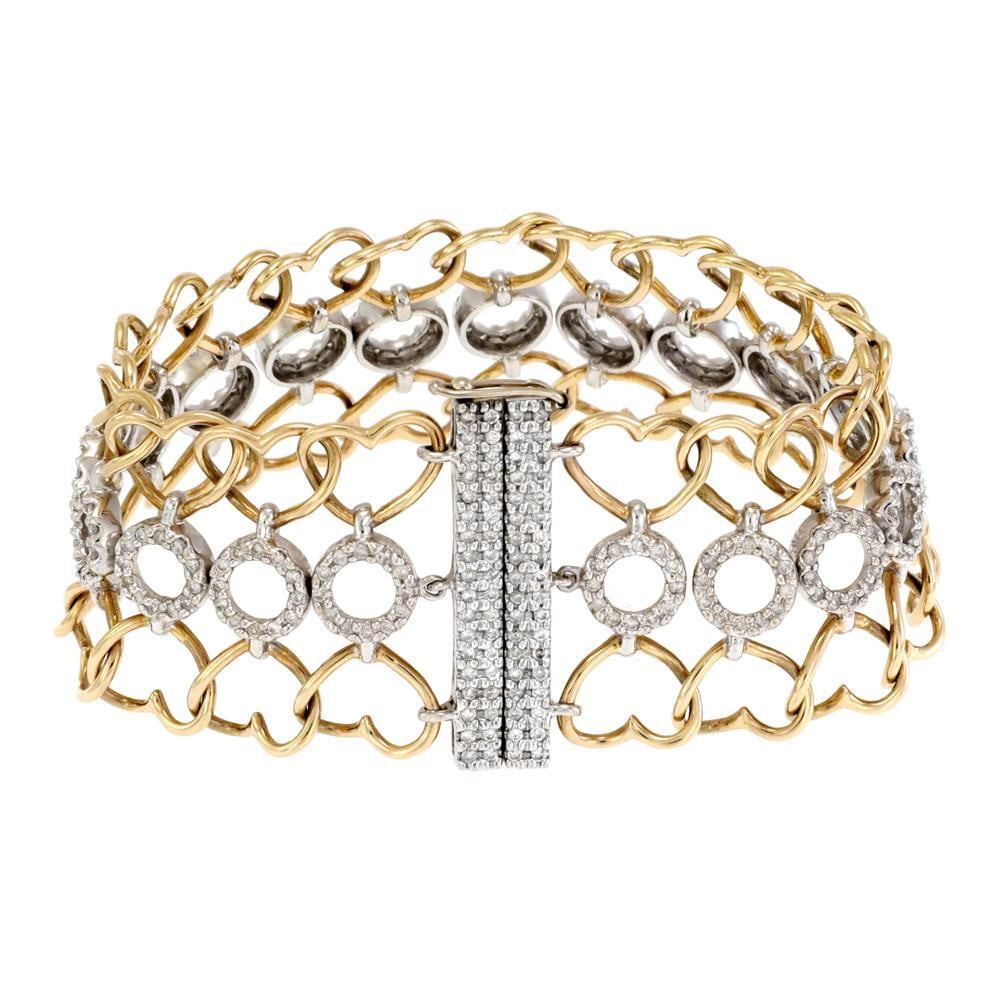Elegant 2ct Diamond 14k Gold Heart & Circle Link Bracelet: Elegant 2ct Diamond 14k Gold Heart & Circle Link Bracelet This elegant bracelet showcases a stunning combination of 14k yellow and white gold, featuring a polished finish. The design includes a wide b