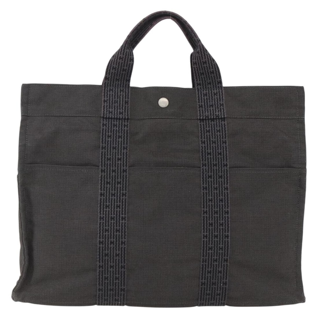 Hermes Canvas Fourre-tout Herline Tote Gray 43cm x 30cm x 10cm: Hermes Canvas Fourre-tout Herline Tote Gray 43cm x 30cm x 10cm Hermes Fourre-tout Herline tote bag in gray canvas designed for women. This spacious tote features signs of use including surface deforma