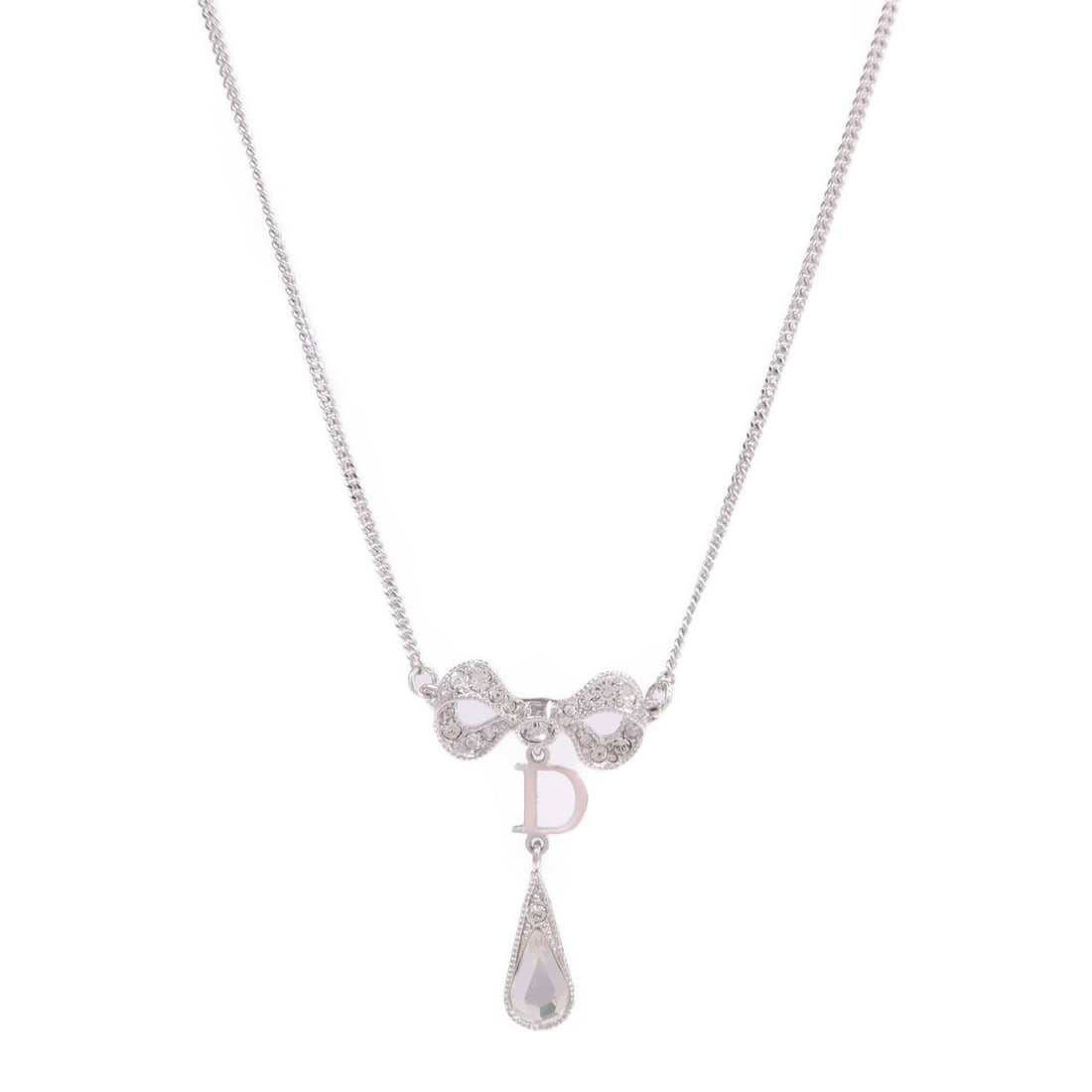 Dior CD Silver Tone Necklace With Pink and Clear Accents: Dior CD Silver Tone Necklace With Pink and Clear Accents This Christian Dior necklace features a sleek metal design in silver with clear and pink accents. Crafted for women, this piece offers a refine