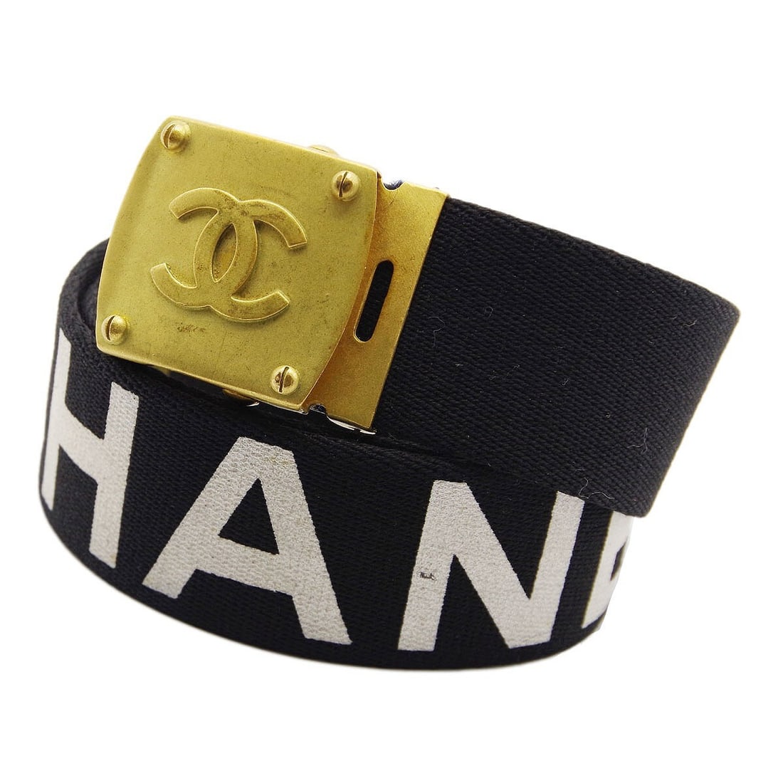 Chanel 90s Black Canvas Adjustable Waist Belt with Buckle: Chanel 90s Black Canvas Adjustable Waist Belt with Buckle This stylish Chanel black GI belt from the 90s is a versatile addition to any wardrobe. Designed as a waist belt, it features an adjustable fi