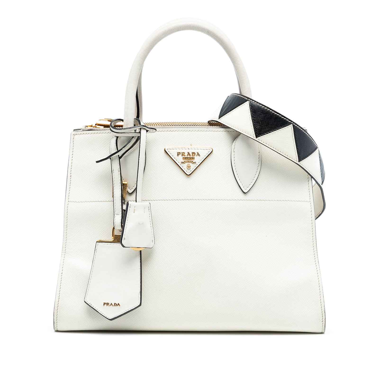 Saffiano Greche Paradigme Satchel by Prada with Leather Trim: Saffiano Greche Paradigme Satchel by Prada with Leather Trim This Prada City Calf Trimmed Saffiano Greche Paradigme Bag features a leather body with rolled leather handles and a detachable flat strap.