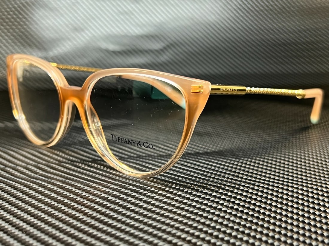 Tiffany TF2206 8299 Sand Gradient Round Women's Eyeglasses with Authenticity: Tiffany TF2206 8299 Sand Gradient Round Women's Eyeglasses with Authenticity Discover the elegance of Tiffany TF2206 8299 Sand Gradient Round Eyeglasses. These stylish women's eyeglasses feature a chi
