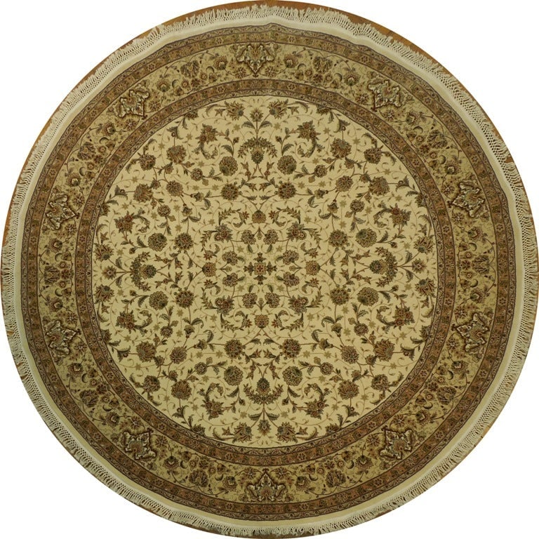 8.2 x 8.3 Ivory Hand-Knotted Wool and Silk Rug Elegant Design: 8.2 x 8.3 Ivory Hand-Knotted Wool and Silk Rug Elegant Design Free continental US Shipping This 8.2 x 8.3 ivory hand-knotted rug is crafted from a premium blend of wool and silk, offering both durabil