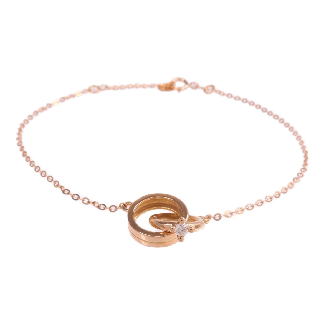 Diamond Bracelet in 18K Rose Gold by JEWELRY: Diamond Bracelet in 18K Rose Gold by JEWELRY This women's bracelet features a sophisticated design crafted from 18K pink (rose) gold and is adorned with sparkling diamonds. The piece exhibits reasonab