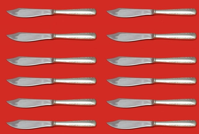 Gorham Camellia Sterling Silver Fish Knife Set 12 pcs 8 1/4 inch: Gorham Camellia Sterling Silver Fish Knife Set 12 pcs 8 1/4 inch This exquisite set features 12 pieces of Camellia pattern fish knives crafted by Gorham. Each knife measures 8 1/4 inches and showcases