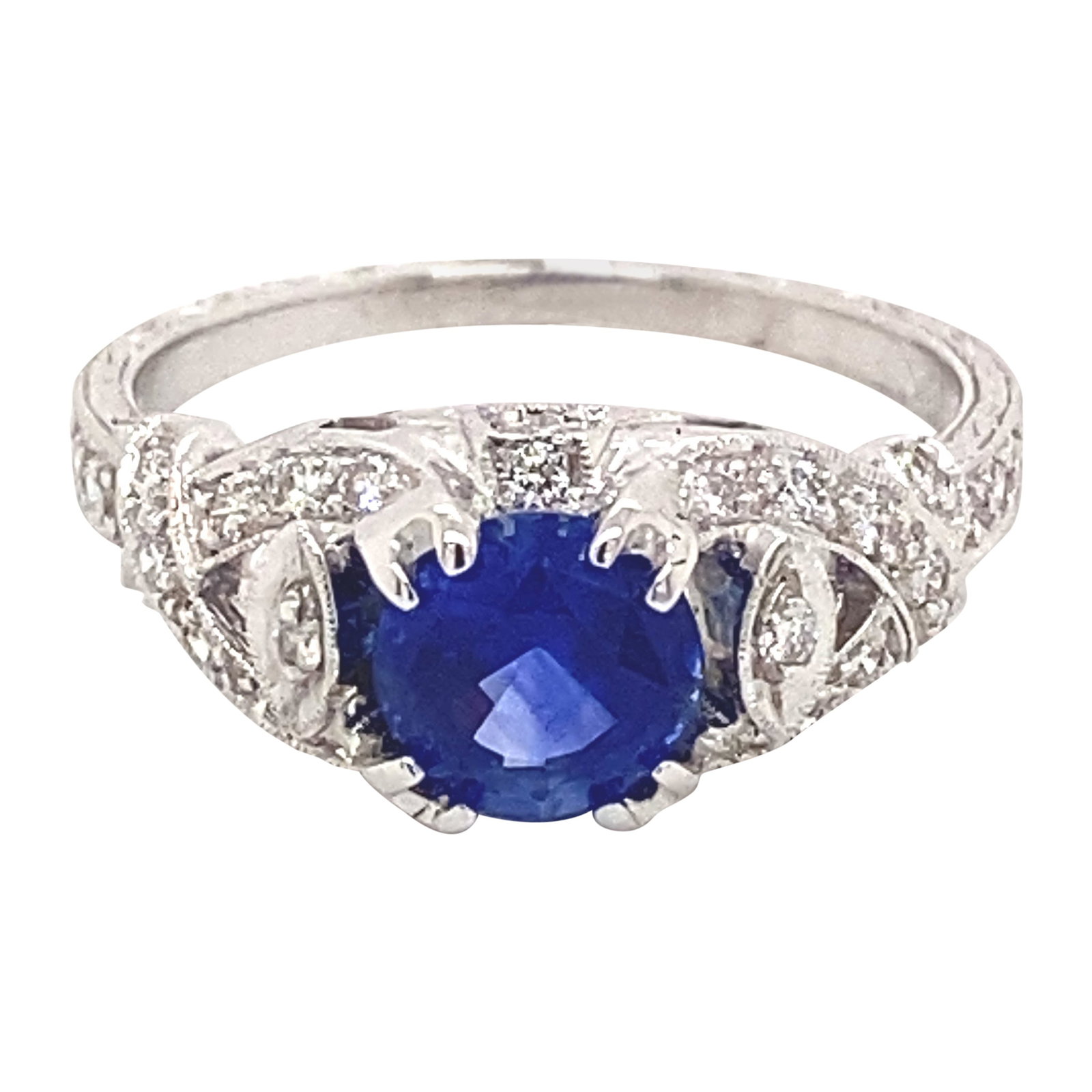Art Deco 1.82ct Ceylon Sapphire Diamond Ring 18k White Gold: Art Deco 1.82ct Ceylon Sapphire Diamond Ring 18k White Gold This stunning Art Deco style ring showcases a beautiful 1.82 carat total gemstone weight, featuring a captivating 1.50 carat round Sri Lanka