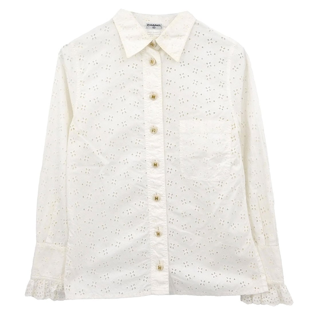 White Cotton Long Sleeve Blouse by Chanel Size FR 34: White Cotton Long Sleeve Blouse by Chanel Size FR 34 This vintage Chanel blouse features a long sleeve design and is crafted from 100% cotton in a crisp white color. Designed in a regular fit and basi