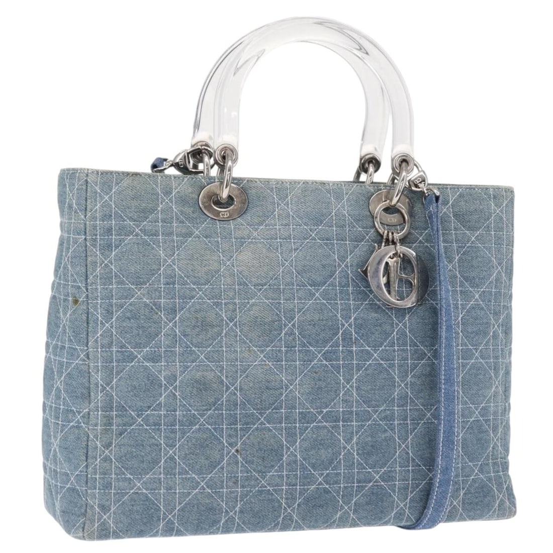 Vintage Lady Dior Blue Canvas Handbag by Christian Dior: Vintage Lady Dior Blue Canvas Handbag by Christian Dior This Christian Dior Vintage Lady Dior bag features the iconic Cannage quilt pattern in blue denim canvas. Designed for women, it is crafted in I