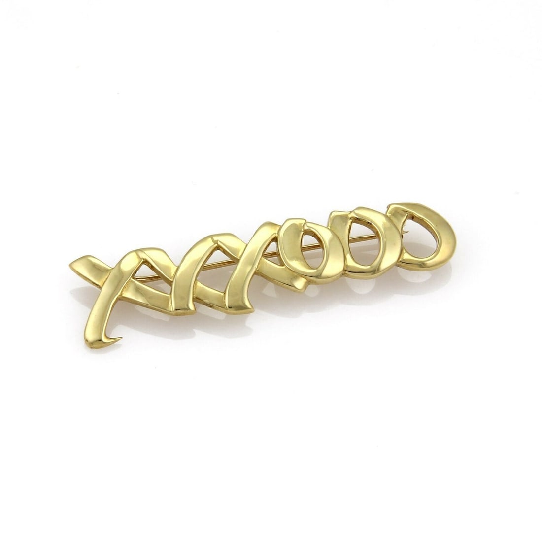 Paloma Picasso XO Motif 18k Yellow Gold Brooch by Tiffany & Co.: Paloma Picasso XO Motif 18k Yellow Gold Brooch by Tiffany & Co. This Tiffany & Co. Paloma Picasso XO Love pin brooch is expertly crafted in 18k yellow gold and features the iconic XO motif, symbolizin