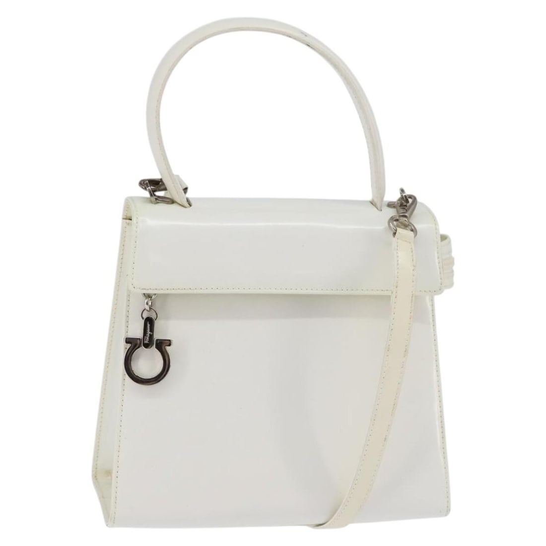 White Patent Leather Gancini Shoulder Bag by Salvatore Ferragamo: White Patent Leather Gancini Shoulder Bag by Salvatore Ferragamo This Salvatore Ferragamo Gancini handbag is crafted from white patent leather and designed for women. It features both a handle and a s