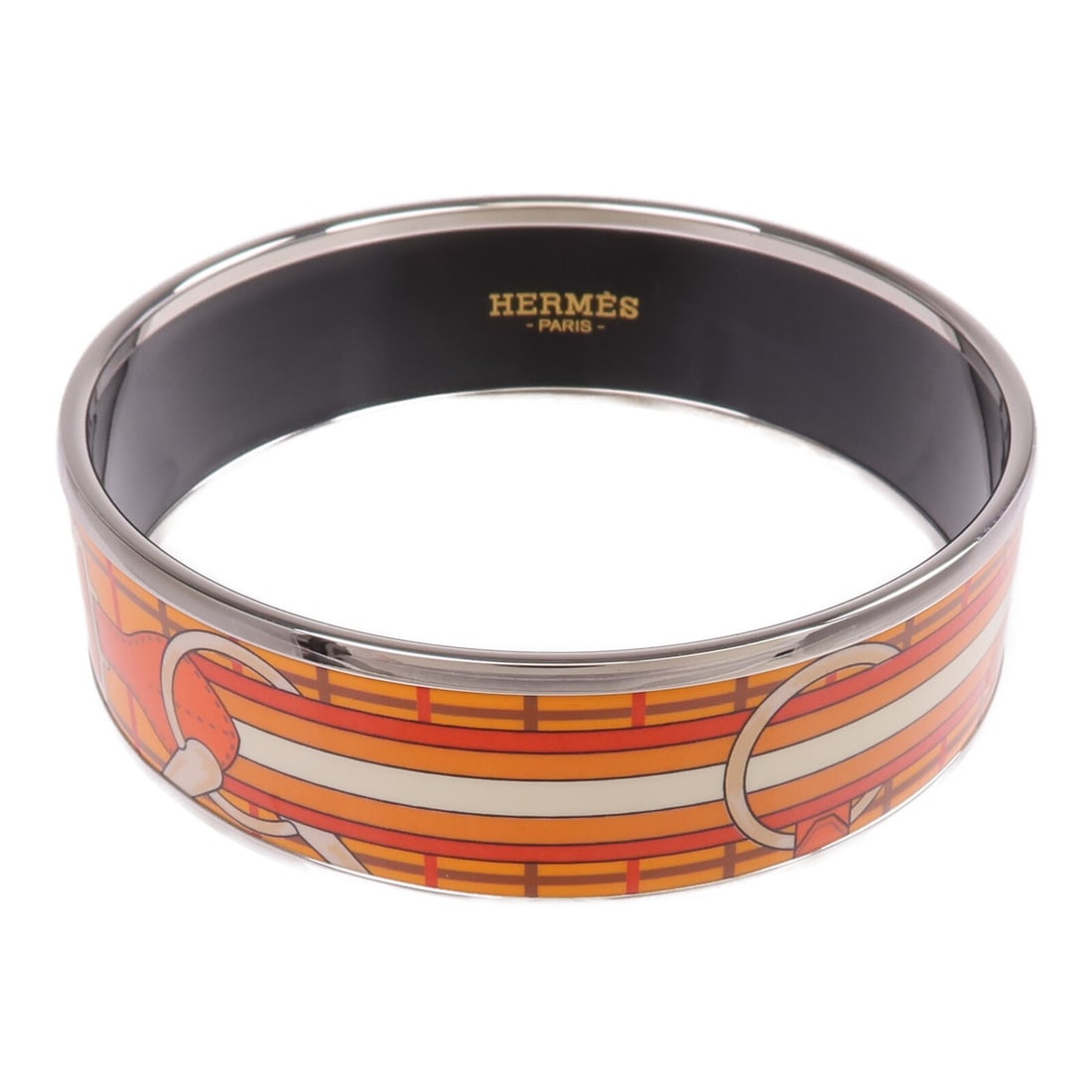 Orange Enamel Silver Bangle Bracelet by HERMES France: Orange Enamel Silver Bangle Bracelet by HERMES France This Hermes bangle features vibrant orange enamel with silver-tone metal accents. Crafted in France, it showcases a sleek design without any stone
