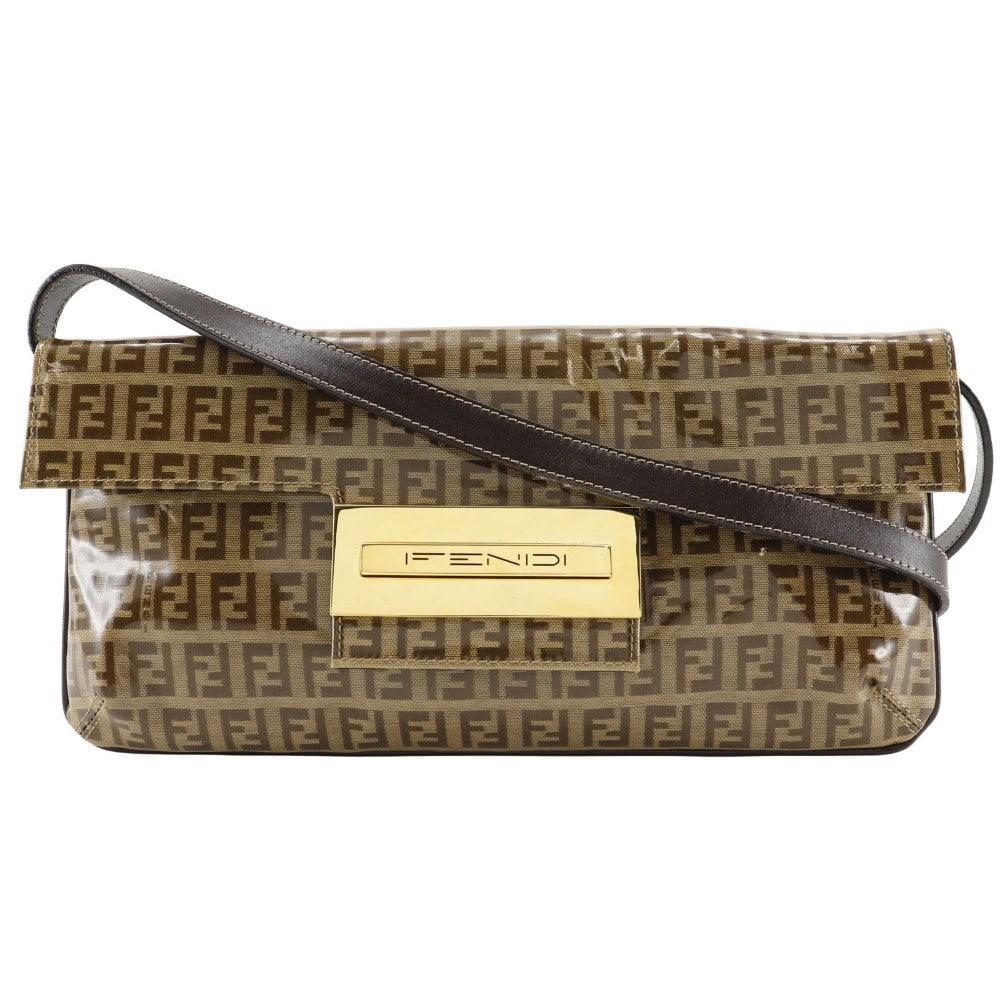 Fendi Zucchino Mamma Baguette Brown Plastic Shoulder Bag: Fendi Zucchino Mamma Baguette Brown Plastic Shoulder Bag This Fendi Zucchino Mamma Baguette features a brown vinyl exterior with the iconic Zucchino pattern. Designed for women, it offers a stylish an