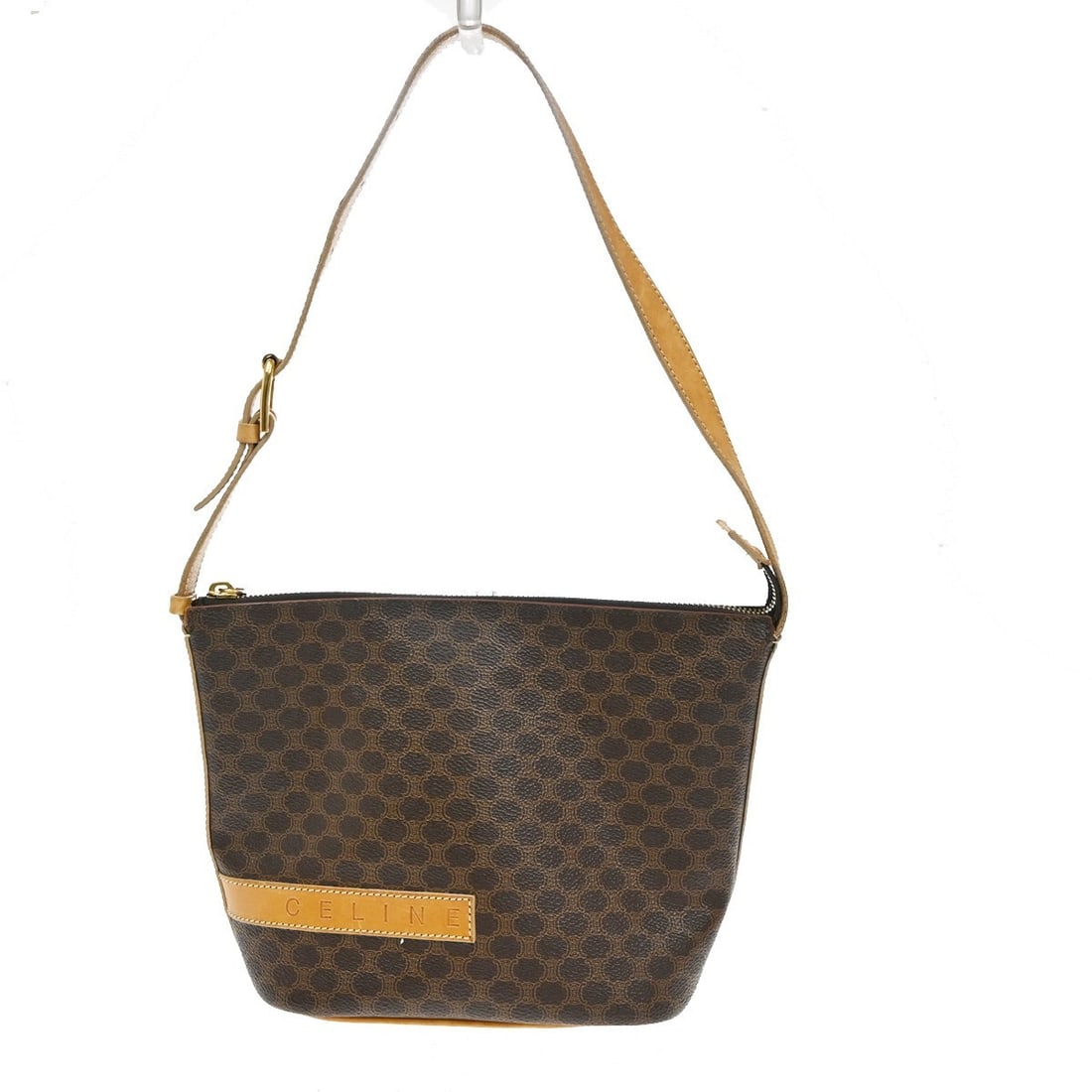 Celine Macadam Brown Canvas Shoulder Bag 26.5x18x11cm: Celine Macadam Brown Canvas Shoulder Bag 26.5x18x11cm This pre-owned Celine Macadam shoulder bag for women features a brown canvas construction with leather trim. It measures 26.5cm x 18cm x 11cm and