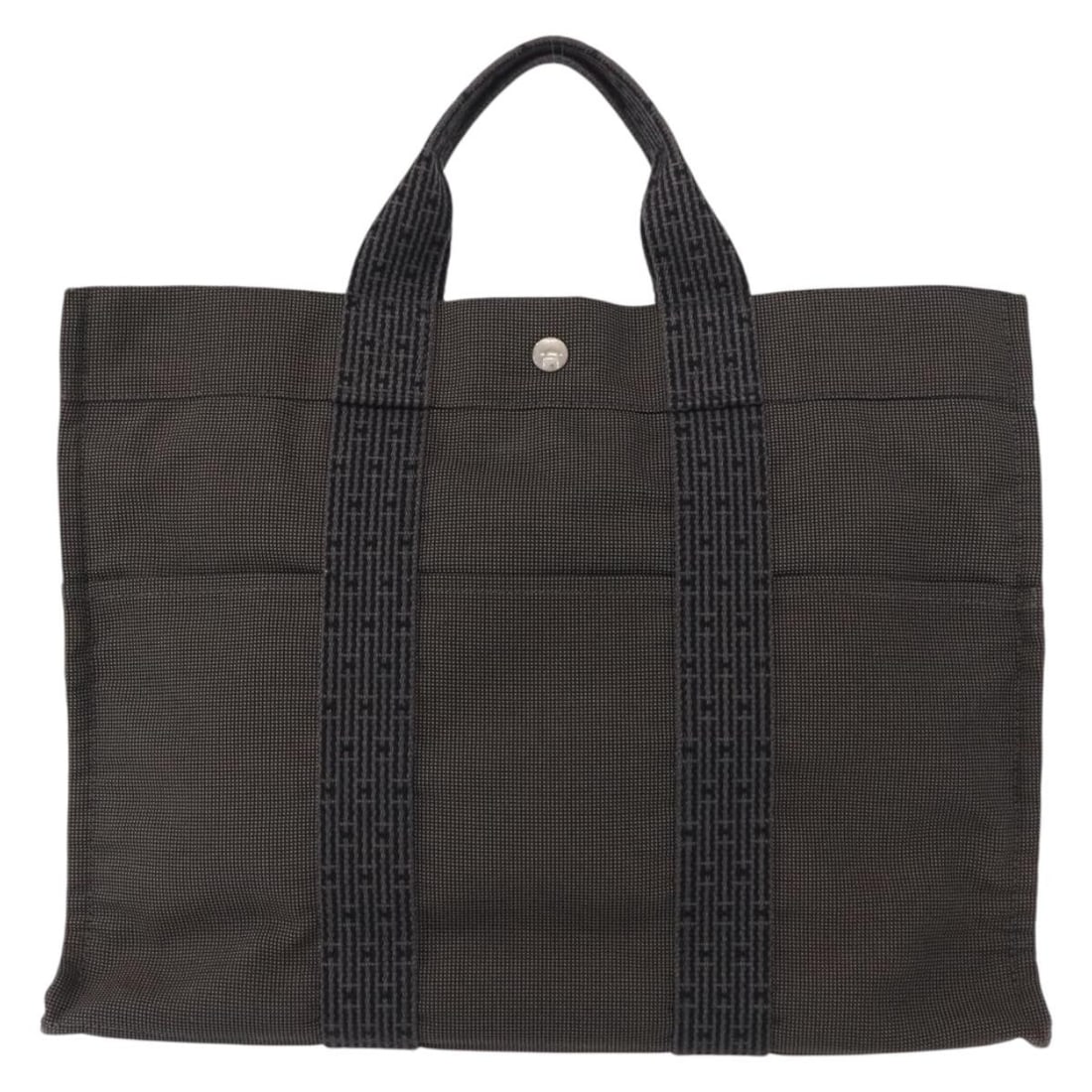 Hermes Fourre-tout Herline Canvas Tote Bag Gray 43cm by 30cm by 10cm: Hermes Fourre-tout Herline Canvas Tote Bag Gray 43cm by 30cm by 10cm Hermes Fourre-tout Herline tote bag designed for women in gray canvas. The bag features a spacious design with signs of wear includ