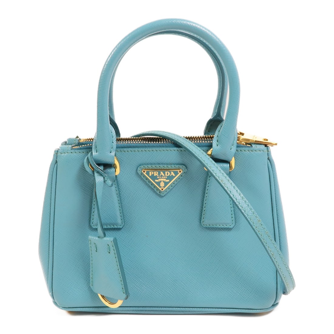 Prada Micro Galleria Calfskin Green Convertible Shoulder Bag with Gold Hardware: Prada Micro Galleria Calfskin Green Convertible Shoulder Bag with Gold Hardware This PRADA Micro Galleria 2-way shoulder bag features a turquoise green calfskin leather exterior and a compact, structu