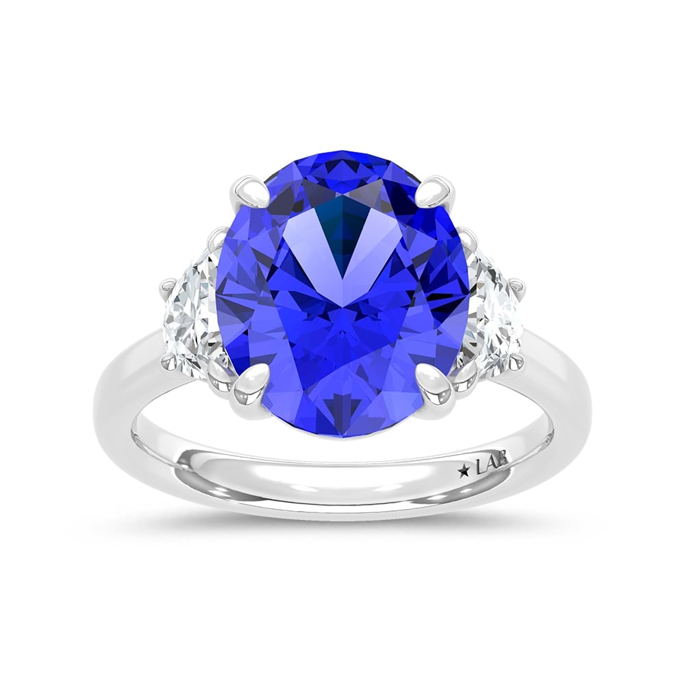14K White Gold Lab Grown Diamond 7 1/5 Ct.Tw. Oval Shape Recrystalized Blue Sapphire Engagement Ring: 14K White Gold Lab Grown Diamond 7 1/5 Ct.Tw. Oval Shape Recrystalized Blue Sapphire Engagement Ring (Center 6 5/8 ct) Exude timeless sophistication with this 14K white gold engagement ring. Its cente