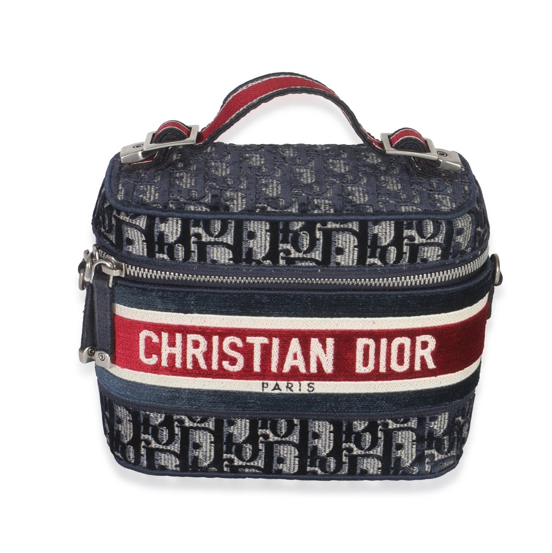 Diortravel Vanity Case Blue and Red Canvas Top Handle Bag: Diortravel Vanity Case Blue and Red Canvas Top Handle Bag This Christian Dior Diortravel Vanity Case features a blue and red velvet oblique pattern on canvas with a zip-around closure. Designed with a