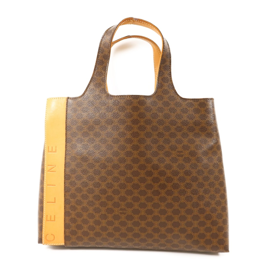 Brown Coated Canvas Handbag by CELINE with Gold Tone Hardware: Brown Coated Canvas Handbag by CELINE with Gold Tone Hardware This CELINE handbag features a brown PVC coated canvas exterior with a structured silhouette. Designed for everyday use, it offers a regul