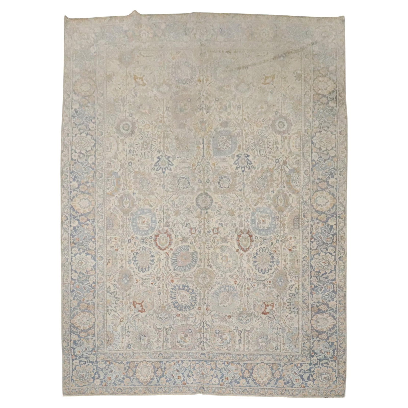 Early 20th Century Persian Tabriz Wool Rug 8' x 10' 9": Early 20th Century Persian Tabriz Wool Rug 8' x 10' 9" This early 20th-century Persian Tabriz rug features an ivory ground and is hand-woven from wool. Showcasing American Colonial style influences, i