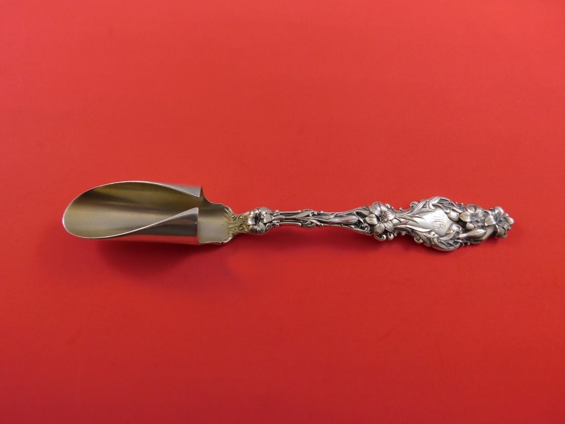 Whiting Lily Sterling Silver Cheese Scoop Gold Washed 8 1/4 Inch: Whiting Lily Sterling Silver Cheese Scoop Gold Washed 8 1/4 Inch Experience elegance with this stunning cheese scoop from the Lily pattern by Whiting. Crafted from sterling silver and beautifully gold
