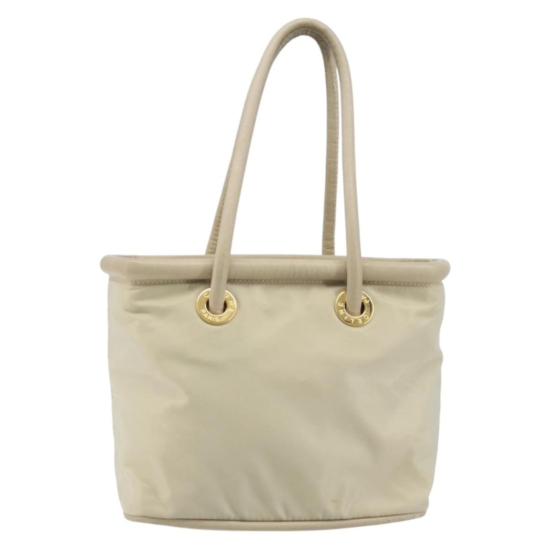 Celine Beige Nylon Tote Bag 23cm x 20cm x 14cm Italy: Celine Beige Nylon Tote Bag 23cm x 20cm x 14cm Italy This Celine handbag is crafted from beige nylon and designed for women. It features a spacious interior and practical dimensions, making it suitabl