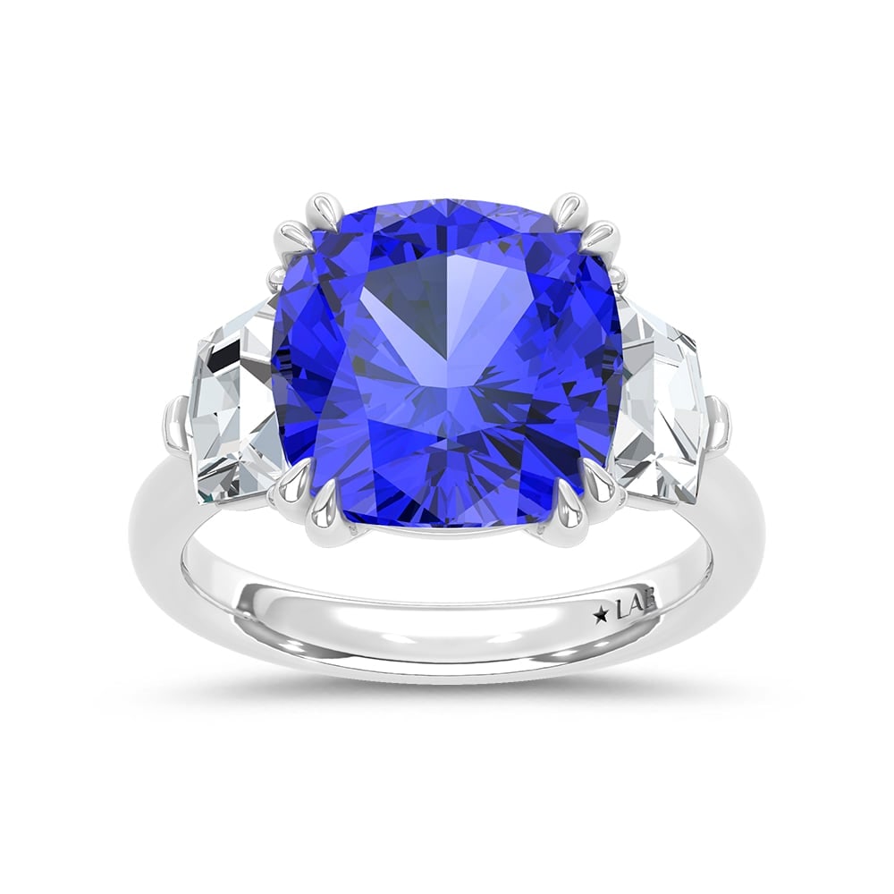 14K White Gold Lab Grown Diamond 9 1/4 Ct.Tw. Cushion Shape Recrystalized Blue Sapphire Engagement: 14K White Gold Lab Grown Diamond 9 1/4 Ct.Tw. Cushion Shape Recrystalized Blue Sapphire Engagement Ring (Center 7 3/4 ct) Exude unmatched elegance with this 14K white gold engagement ring, featuring a