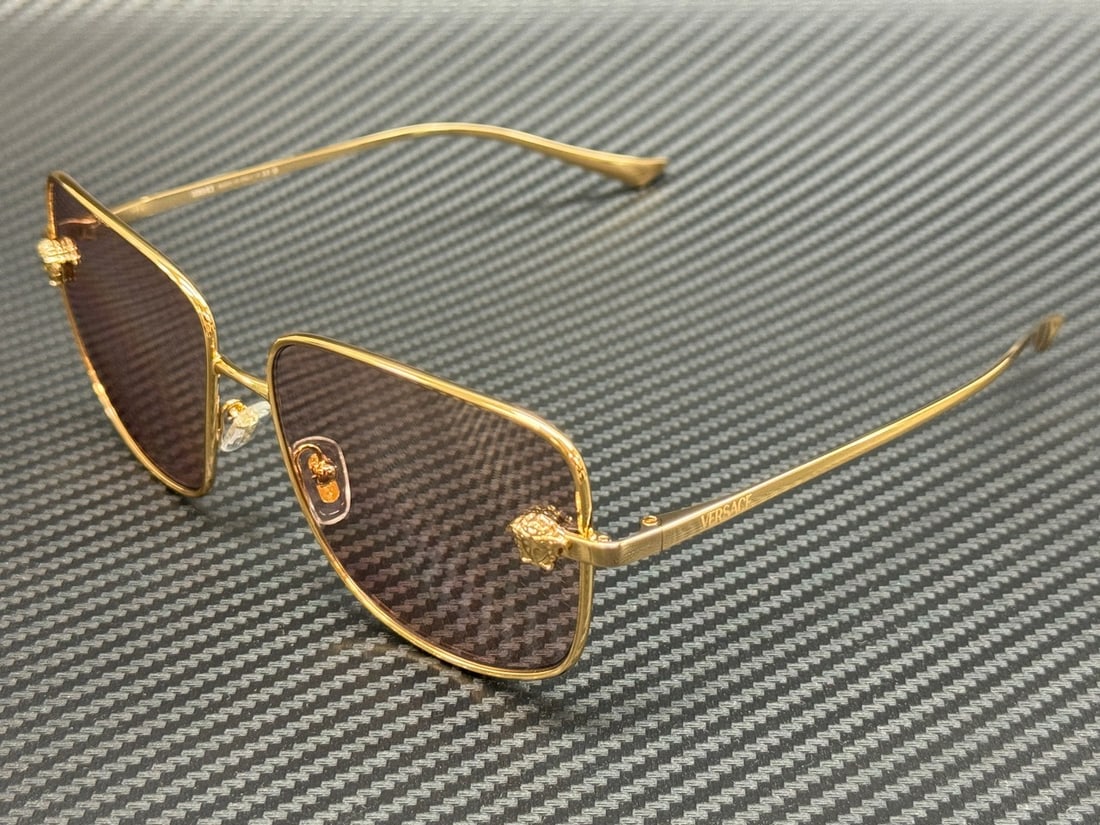 Versace VE2282 1002 5 Gold Frame Pink Silver Women's Sunglasses: Versace VE2282 1002 5 Gold Frame Pink Silver Women's Sunglasses Elevate your style with these stunning Versace VE2282 sunglasses. Featuring a luxurious gold frame paired with pink and silver lenses, t