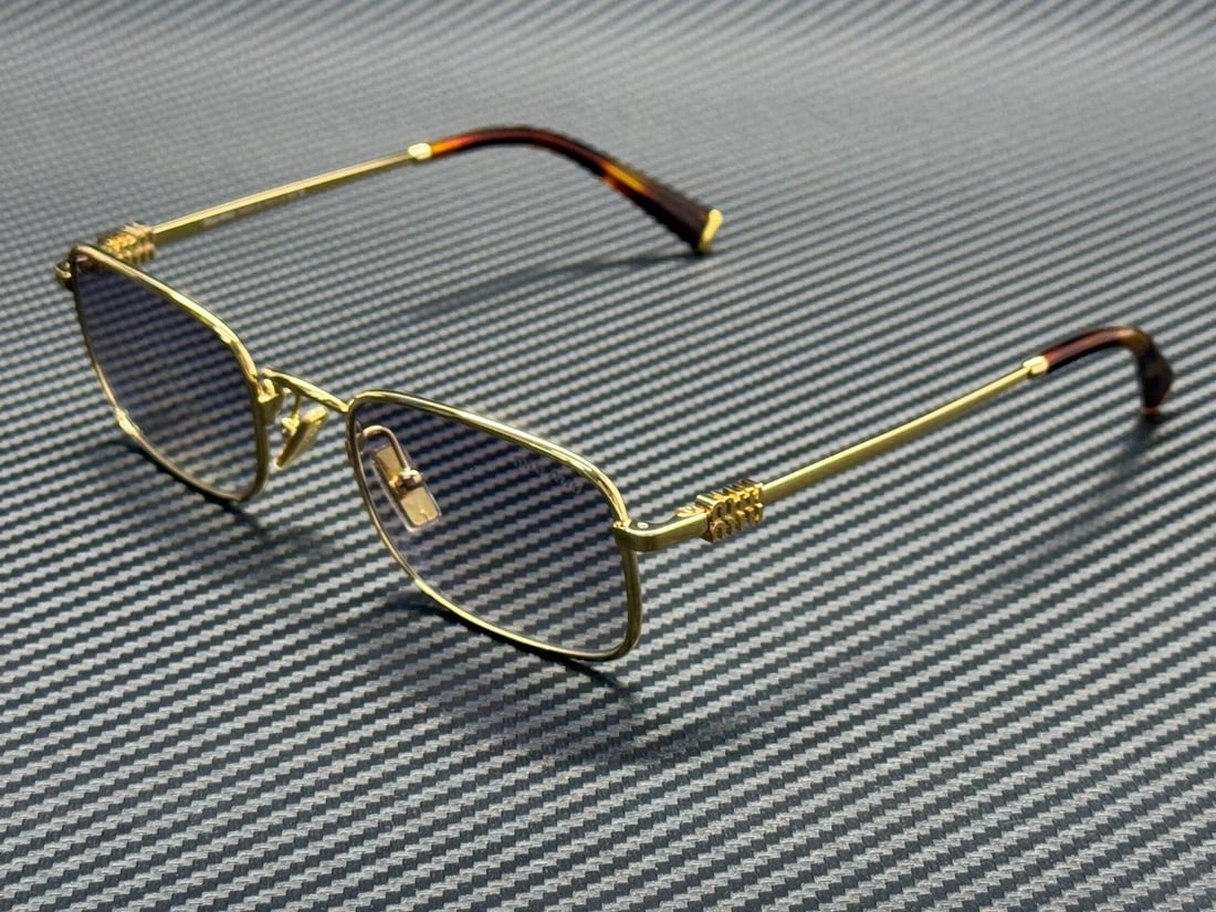 Miu Miu MU A53S 5AK04O Gold Grey Gradient Sunglasses 52mm: Miu Miu MU A53S 5AK04O Gold Grey Gradient Sunglasses 52mm Elevate your accessory collection with these stylish Miu Miu MU A53S 5AK04O sunglasses. Featuring a luxurious gold frame complemented by grey 