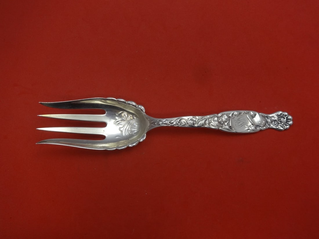 Whiting Heraldic Sterling Silver 9 Inch Buffet Fork: Whiting Heraldic Sterling Silver 9 Inch Buffet Fork This stunning buffet fork from the Heraldic pattern by Whiting is crafted from high-quality sterling silver. Measuring 9 inches, it is expertly desi