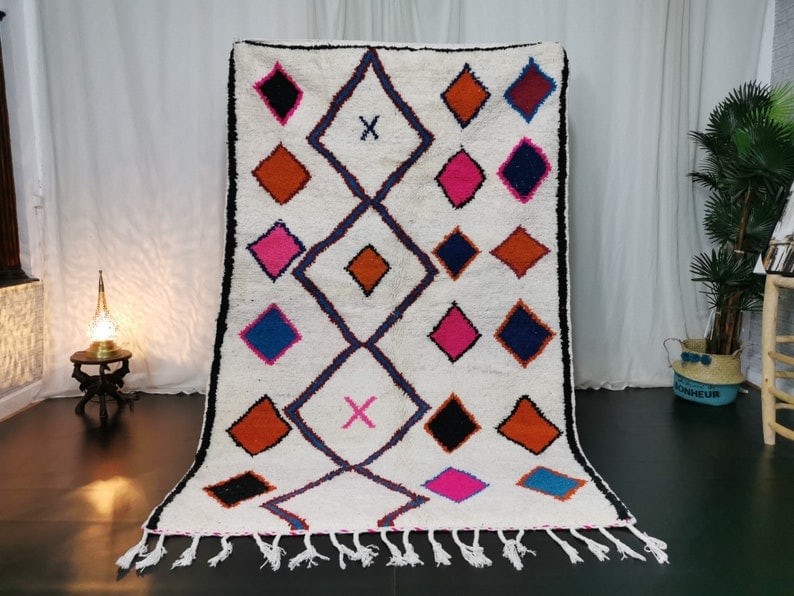 Handmade Moroccan Berber Rug 100% Sheep Wool 8 x 5 Feet: Handmade Moroccan Berber Rug 100% Sheep Wool 8 x 5 Feet Enhance your living space with this beautiful handmade Moroccan Berber rug. Crafted by skilled local Berber women weavers in the Middle Atlas Mo