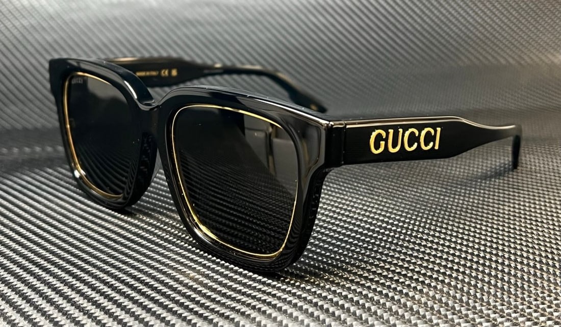 GUCCI GG1136SA 001 Women's Black Dark Grey Sunglasses with Authenticity Cert: GUCCI GG1136SA 001 Women's Black Dark Grey Sunglasses with Authenticity Cert Elevate your style with these GUCCI GG1136SA 001 sunglasses, featuring a sleek black frame complemented by dark grey lenses