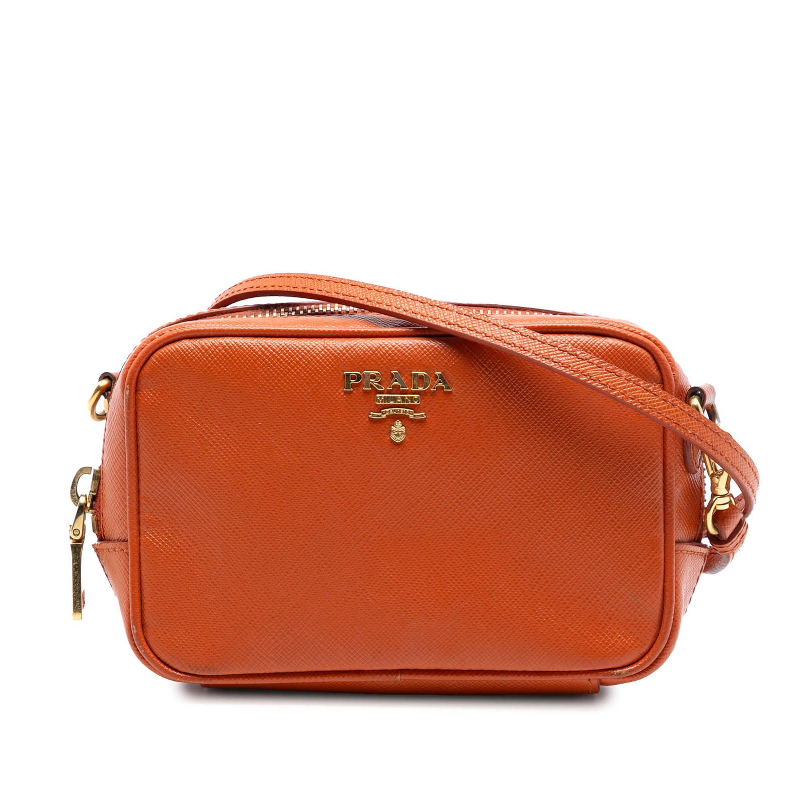 Prada Orange Saffiano Leather Crossbody Camera Bag Italy: Prada Orange Saffiano Leather Crossbody Camera Bag Italy This Prada Saffiano Camera Bag features a saffiano leather body in orange, a flat leather strap, and a top zip closure. The bag shows signs of