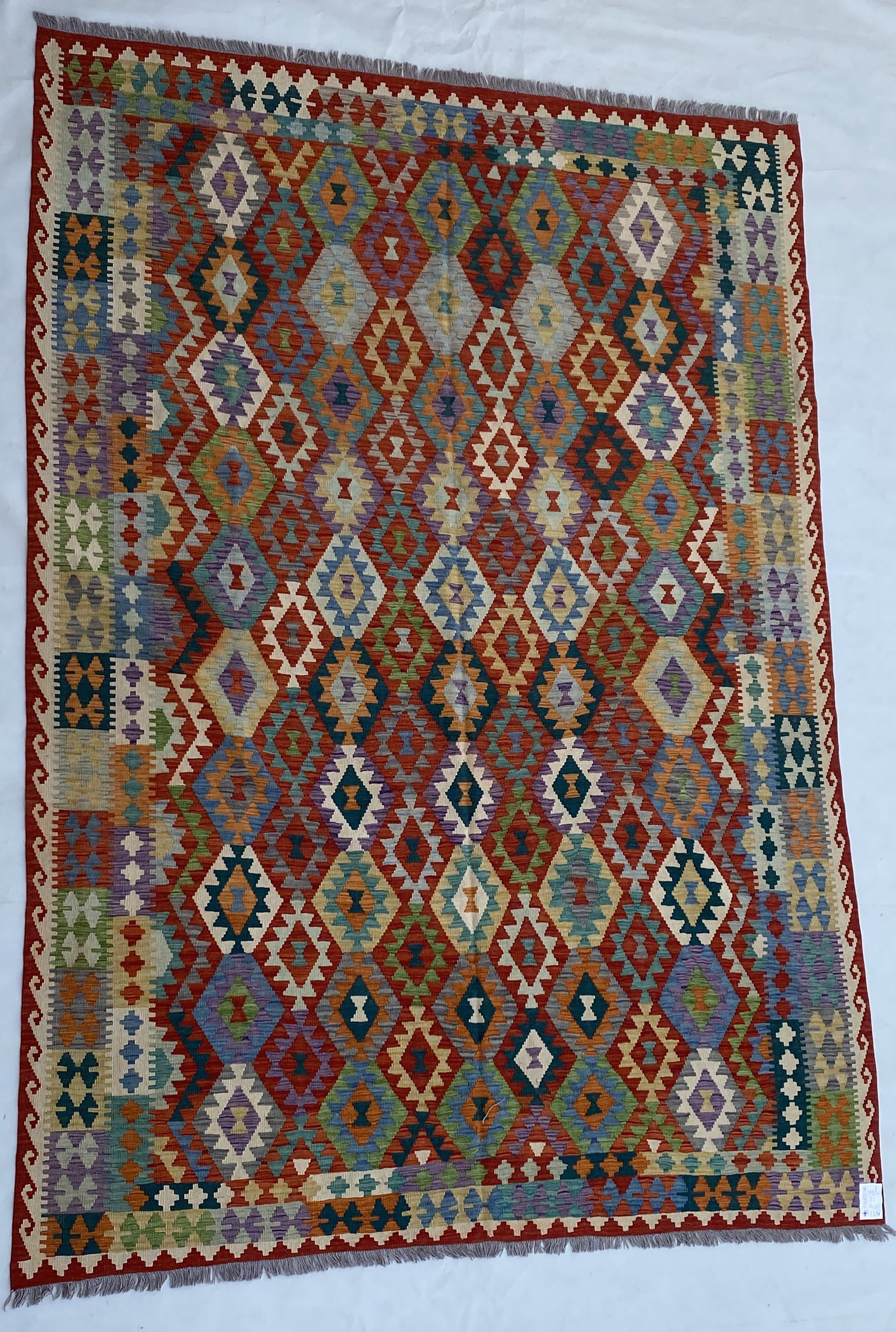 Handwoven 8 x 11 Multi-Color Afghan Kilim Rug Geometric Design: Handwoven 8 x 11 Multi-Color Afghan Kilim Rug Geometric Design Free continental US Shipping Enhance your home decor with the stunning 8 x 11 Multi-Color Afghan Kilim Rug, a beautiful fusion of traditi