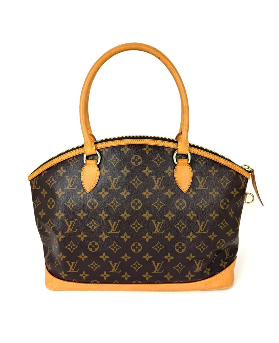 Vintage Louis Vuitton Monogram Canvas Lockit Horizontal Shoulder Bag: Vintage Louis Vuitton Monogram Canvas Lockit Horizontal Shoulder Bag This Louis Vuitton Vintage Monogram Lockit Horizontal Shoulder Bag features the iconic monogram canvas with a coated finish. It is