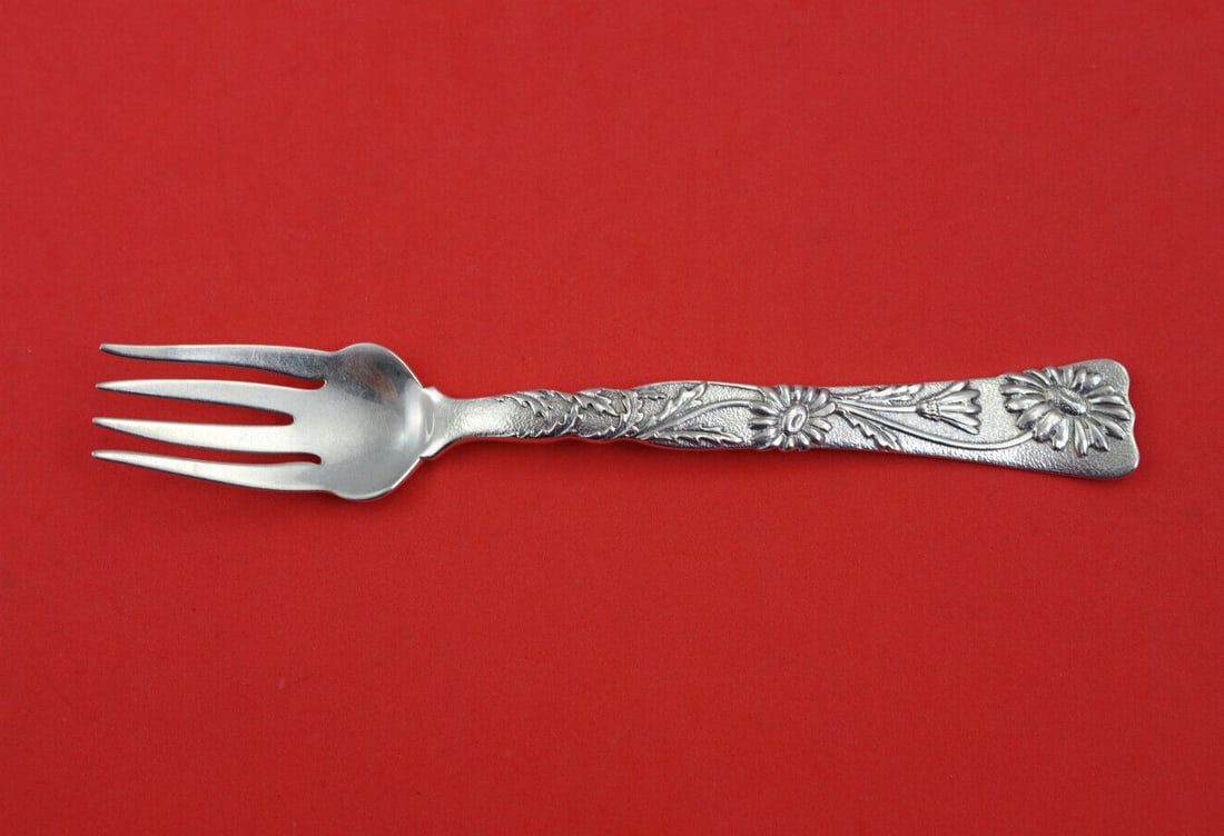 Tiffany Vine Sterling Silver Salad Fish Fork Wavy Tines Daisy Motif: Tiffany Vine Sterling Silver Salad Fish Fork Wavy Tines Daisy Motif Discover a rare find with this exquisite salad/fish fork from the Vine pattern by Tiffany & Co. Crafted from high-quality sterling s