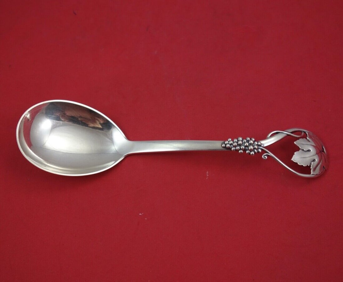 Cohr Sterling Silver 9 Inch Berry Spoon Grape Vine Design: Cohr Sterling Silver 9 Inch Berry Spoon Grape Vine Design This exquisite 9-inch serving spoon from Cohr is crafted from sterling silver and features a beautifully detailed grape vine design. It is in