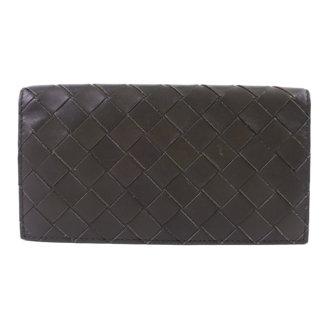 Green Lambskin Bifold Wallet by Bottega Veneta: Green Lambskin Bifold Wallet by Bottega Veneta This BV long bifold wallet features luxurious lambskin leather in a rich green color. Made in Italy, it offers a sleek and stylish design ideal for every