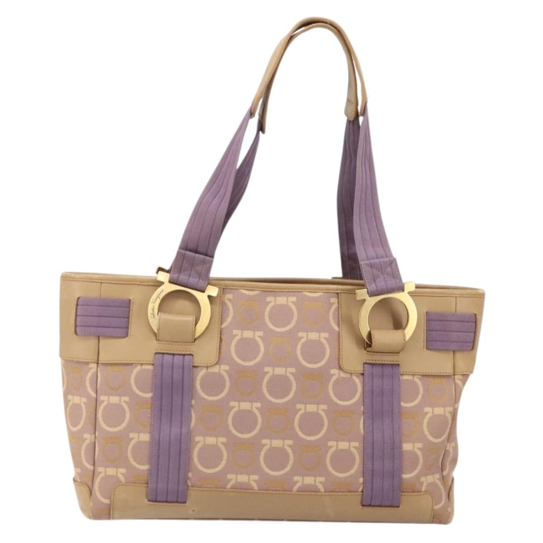 Gancini Canvas Tote in Purple by Salvatore Ferragamo: Gancini Canvas Tote in Purple by Salvatore Ferragamo This Salvatore Ferragamo Gancini Tote is crafted from purple canvas and designed for women. The bag shows signs of use, including some surface shap