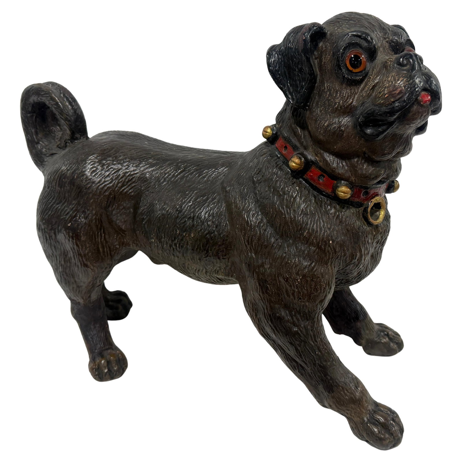 British Colonial Painted Terracotta Pug Sculpture with Amber Glass Eyes Circa 1900s: British Colonial Painted Terracotta Pug Sculpture with Amber Glass Eyes Circa 1900s This English terracotta pug dog sculpture from the early 20th century features a carefully modeled, forward-stepping