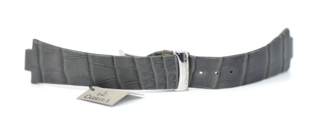 Authentic Chaumet Grey Leather Wristwatch Strap 23.5mm: Authentic Chaumet Grey Leather Wristwatch Strap 23.5mm Enhance your timepiece with this elegant Chaumet grey leather strap, designed for comfort and style. This wristwatch band features a sleek gray h