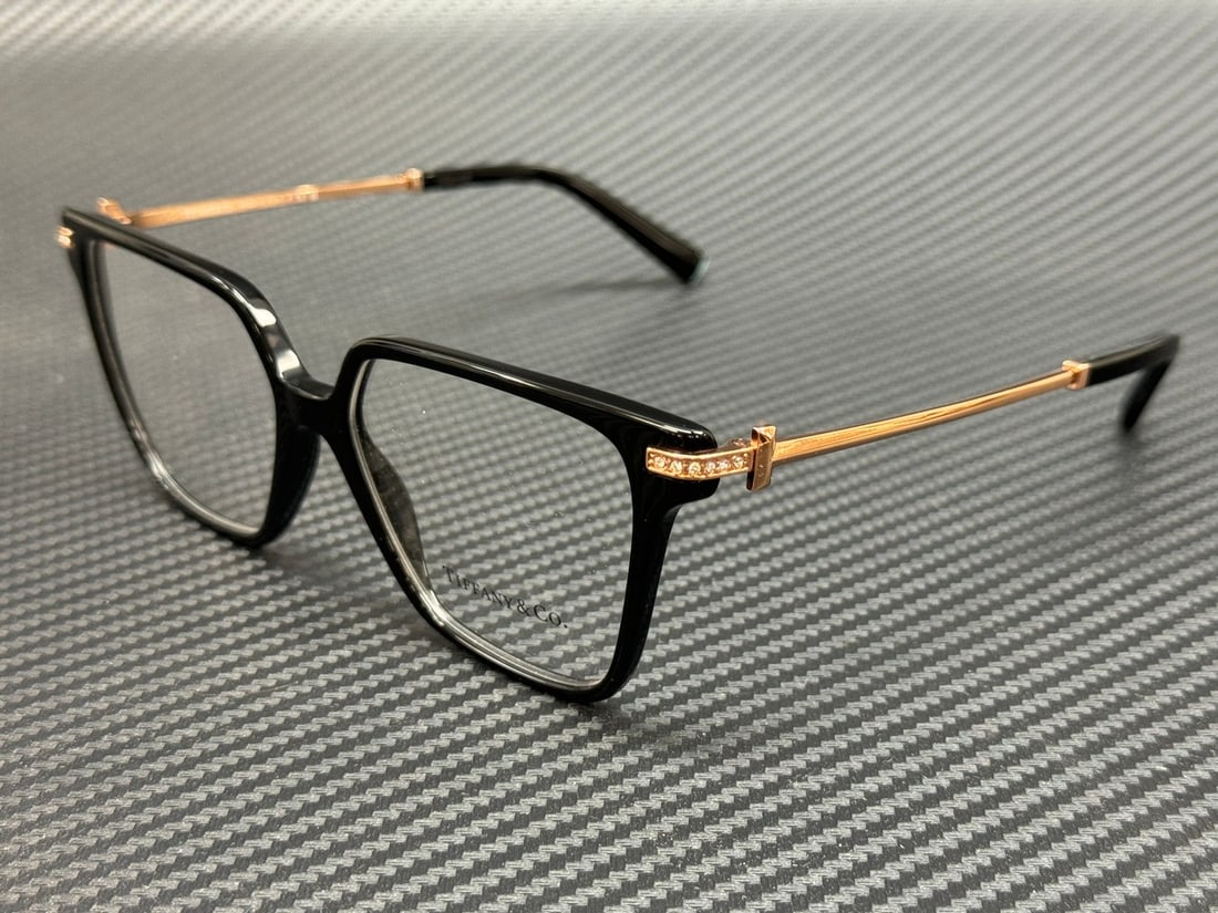 Tiffany TF2234B 8001 Black Frame Rose Gold Women's Eyeglasses with Authenticity Certificate: Tiffany TF2234B 8001 Black Frame Rose Gold Women's Eyeglasses with Authenticity Certificate Elevate your style with these exquisite Tiffany TF2234B 8001 eyeglasses. Featuring a sleek black frame, thes