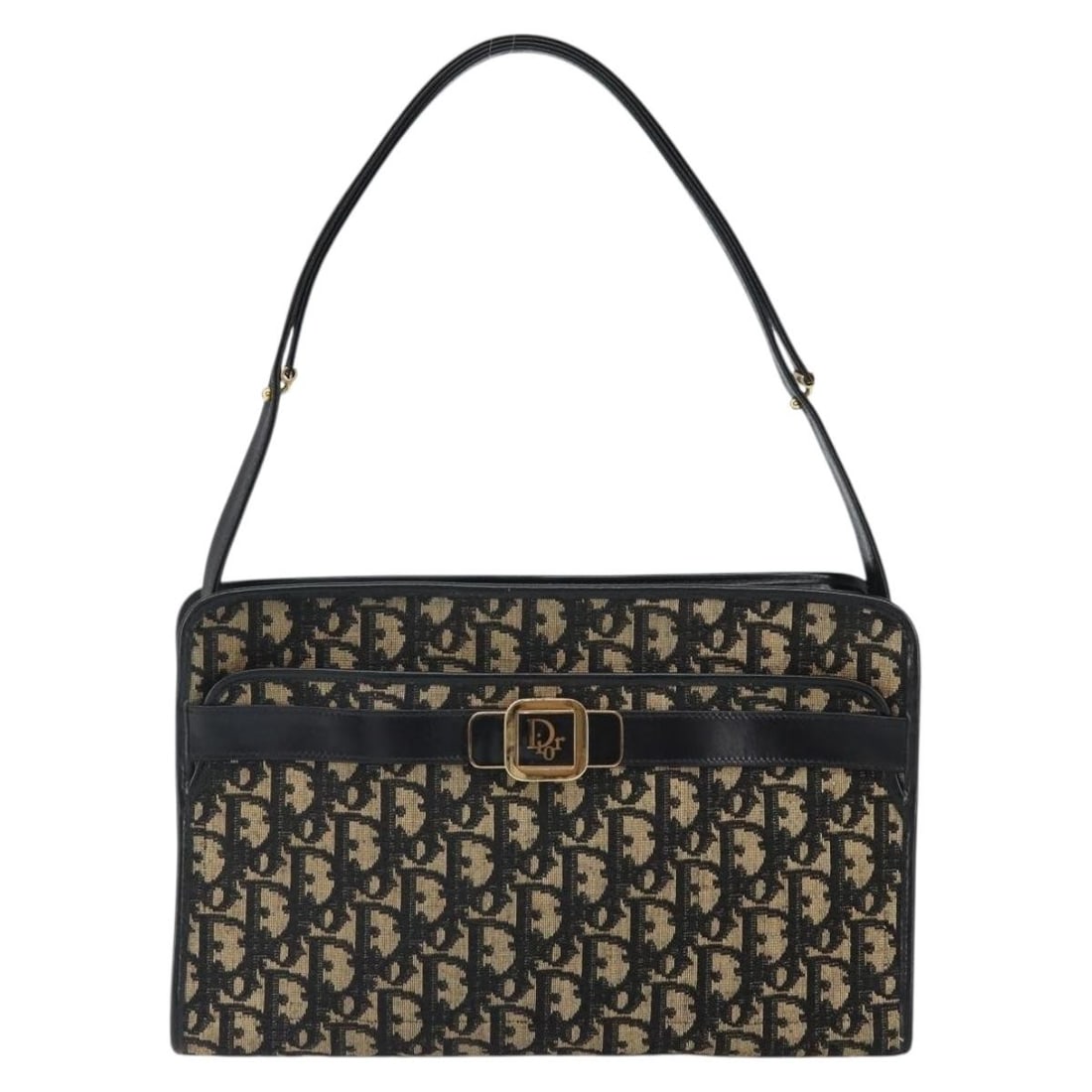 Christian Dior Trotter Navy Canvas Shoulder Bag France: Christian Dior Trotter Navy Canvas Shoulder Bag France This Christian Dior Trotter shoulder bag is crafted from navy canvas and designed for women. The bag shows signs of rubbing, staining, slight los