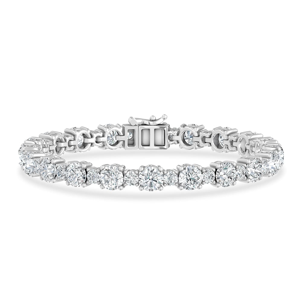 14K White Gold Lab Grown Diamond 12 1/4 Ct.Tw. Fancy Bracelet: 14K White Gold Lab Grown Diamond 12 1/4 Ct.Tw. Fancy Bracelet Designed in polished 14K White Gold, this fashion bracelet features lab grown diamonds totaling 12 1/4 Ct.Tw., offering refined elegance a