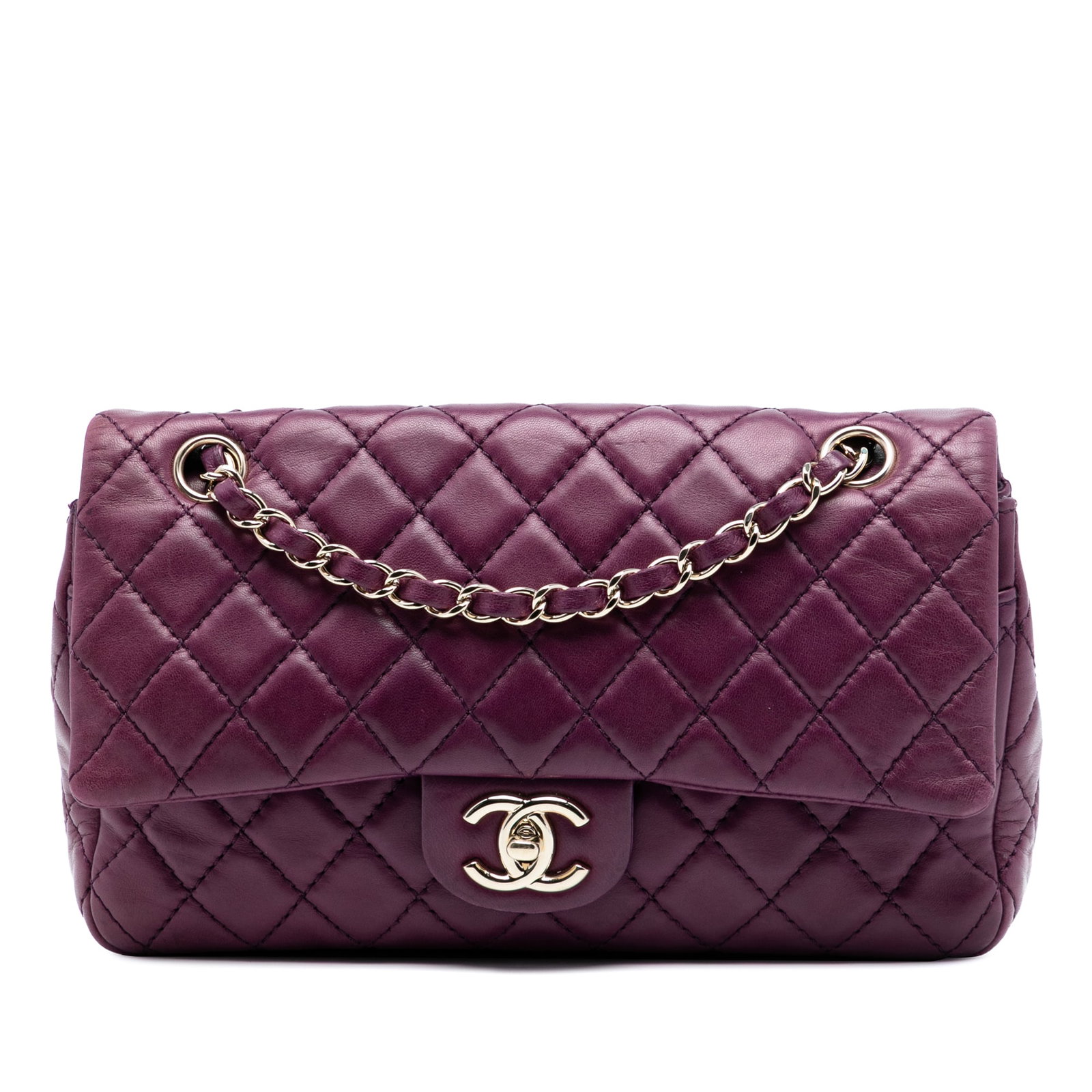 Chanel Purple Quilted Leather Medium Classic Double Flap Shoulder Bag: Chanel Purple Quilted Leather Medium Classic Double Flap Shoulder Bag This Chanel Medium Classic Double Flap shoulder bag features a quilted lambskin leather body in purple, leather-woven chain straps