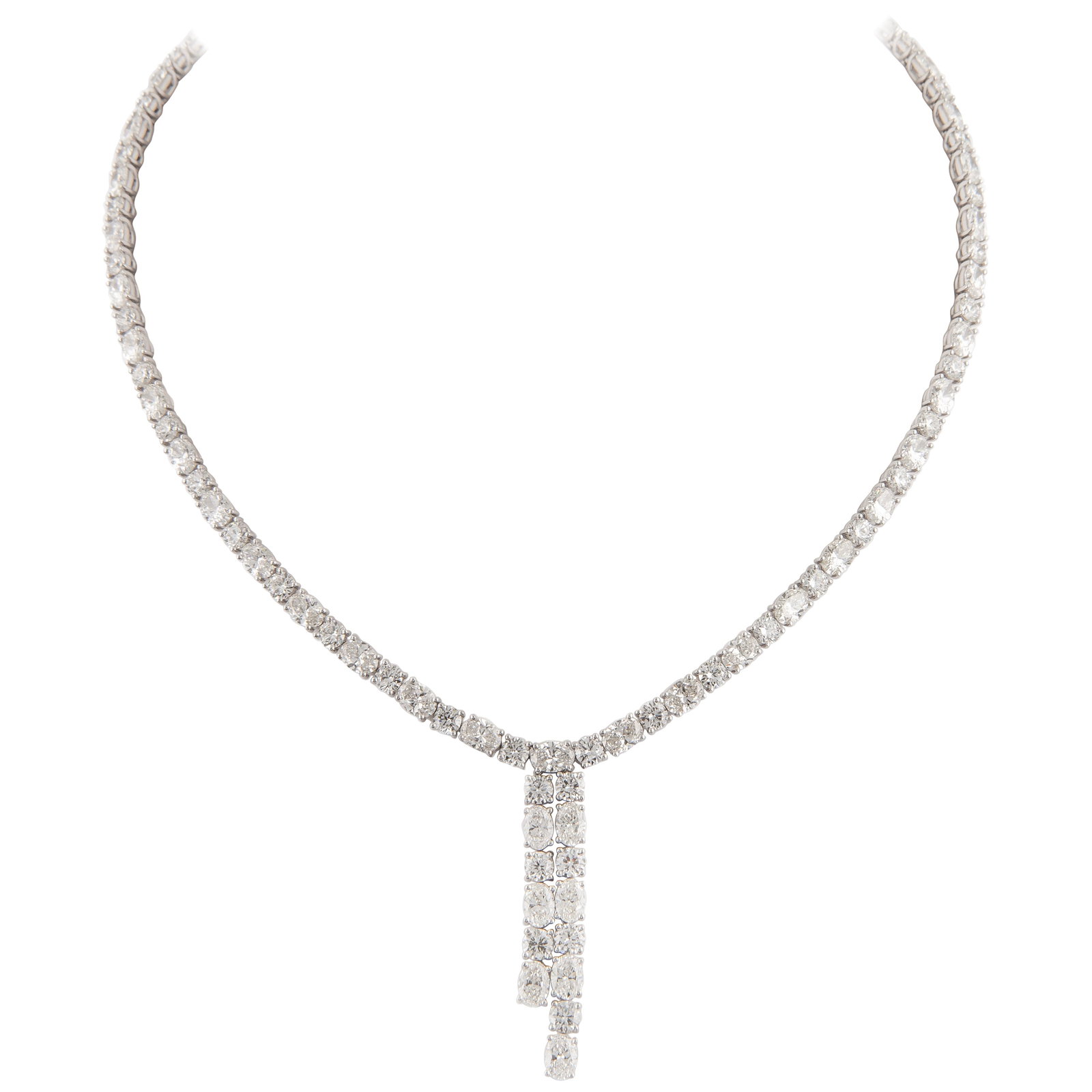 25.09ct Diamond Drop Tennis Necklace 18k White Gold: 25.09ct Diamond Drop Tennis Necklace 18k White Gold This stunning 25.09ct Oval & Round Diamond Drop Tennis Necklace showcases a contemporary design, featuring an exquisite diamond bow motif. Crafted f