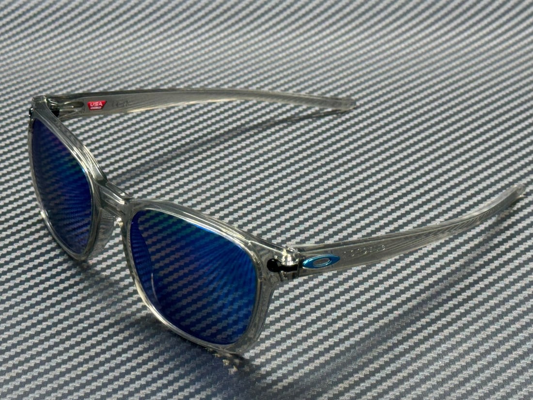 Oakley OO9018 14 Prizm Sapphire Polarized Grey Ink 55mm Men's Sunglasses: Oakley OO9018 14 Prizm Sapphire Polarized Grey Ink 55mm Men's Sunglasses These Oakley OO9018 14 sunglasses feature a Grey Ink frame paired with Prizm Sapphire Polarized lenses, offering both style and